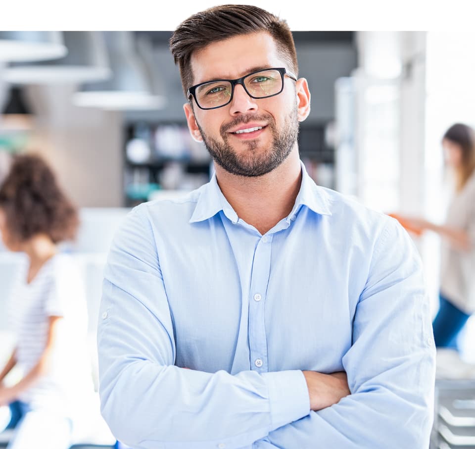 Smiling man with crossed hands